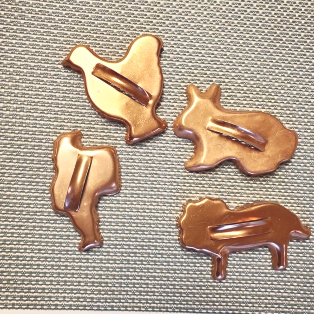 Set of Four Copper Animal Napkin Holders